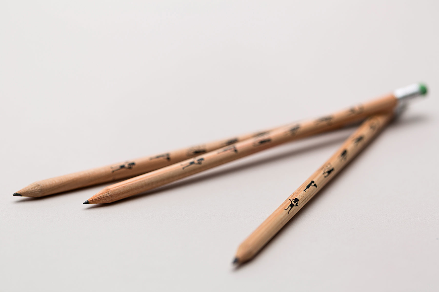 Pencils decorated with stick figure characters