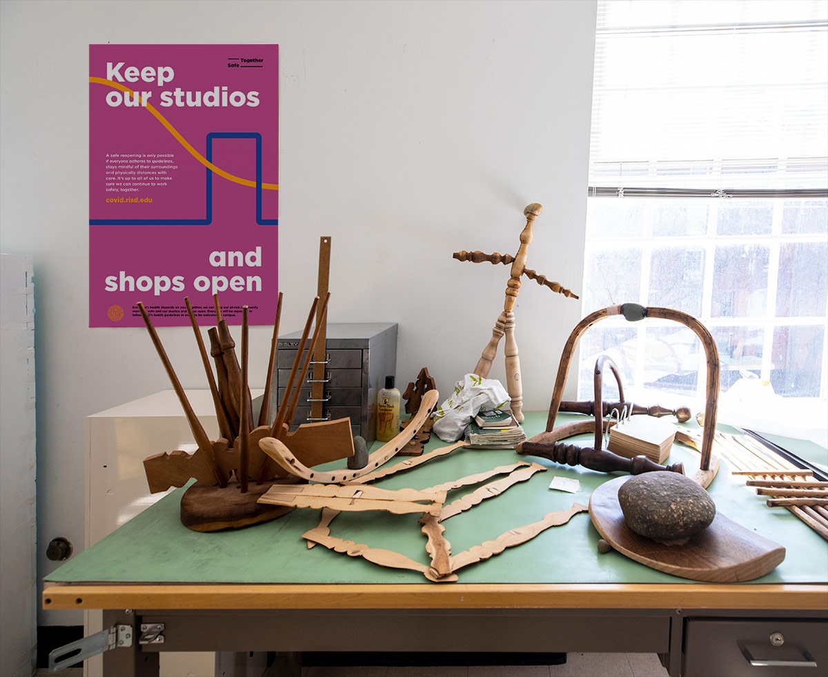 RISD Safe Together Poster in a workspace
