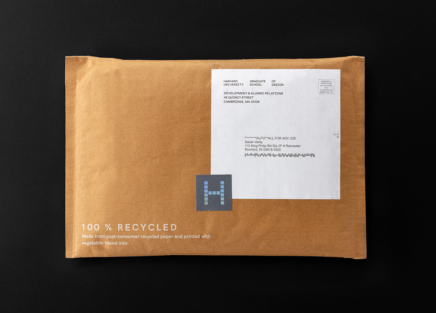 Outside of a mailing envelope that says 100% Recycled Made from post-consumer recycled paper and printed with vegetable-based inks.